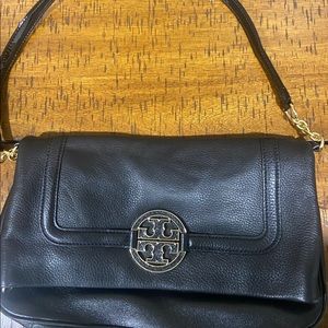 Tory Burch black shoulder bag 13 in length and 8 height, converts to 15 height